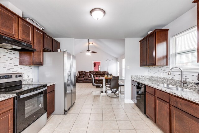 kitchen featuring appliances with stainless steel finishes, sink, backsplash, lofted ceiling, and range hood