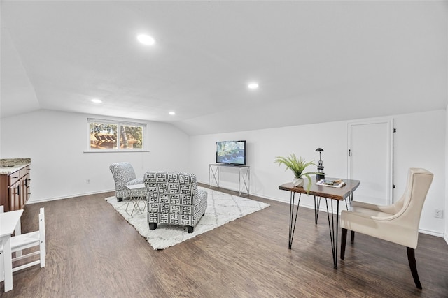 office featuring dark hardwood / wood-style floors and lofted ceiling