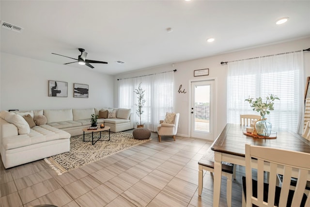 living room featuring ceiling fan