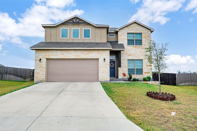 craftsman-style house with a front yard and a garage