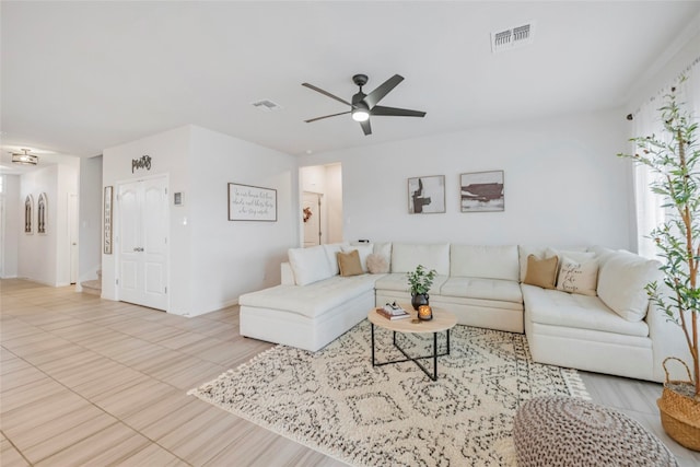 living room with ceiling fan