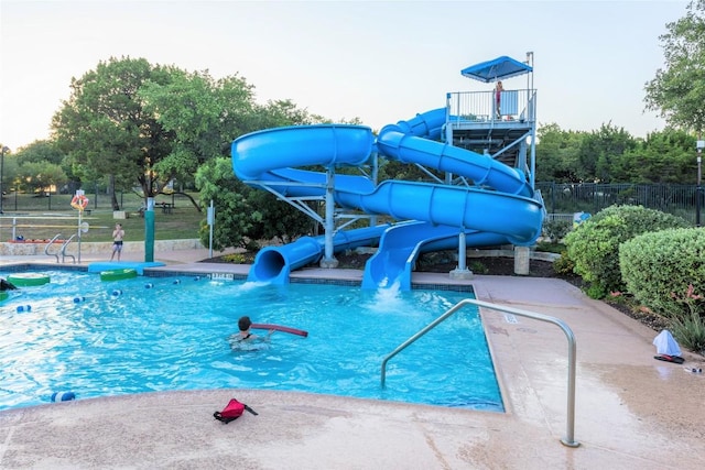 335 Lombardia Dr Unit 19E, Austin, TX 78734 - community pool with fence and a water slide