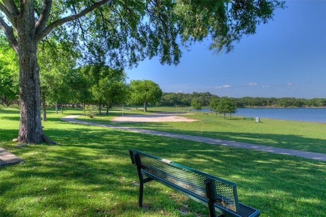 335 Lombardia Dr Unit 19E, Austin, TX 78734 - view of home's community featuring a yard and a water view