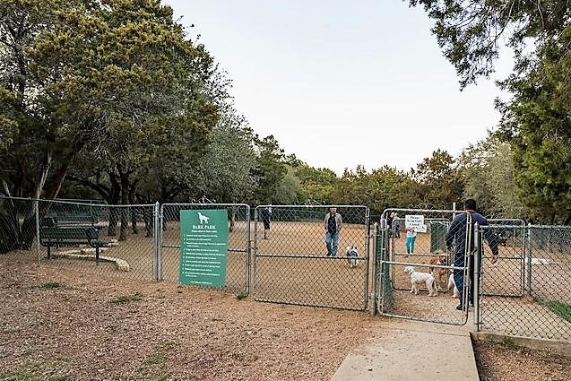 335 Lombardia Dr Unit 19E, Austin, TX 78734 - exterior space featuring fence and a gate
