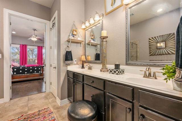 bathroom featuring vanity, ceiling fan, and tile patterned floors