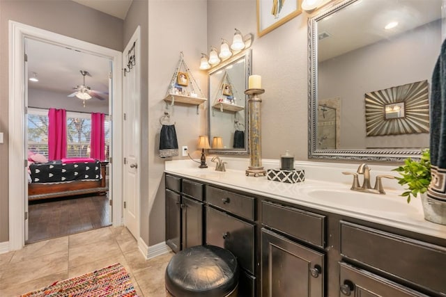 335 Lombardia Dr Unit 19E, Austin, TX 78734 - full bathroom with a sink, ceiling fan, ensuite bath, and double vanity