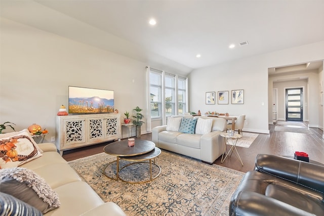 living room with dark hardwood / wood-style floors