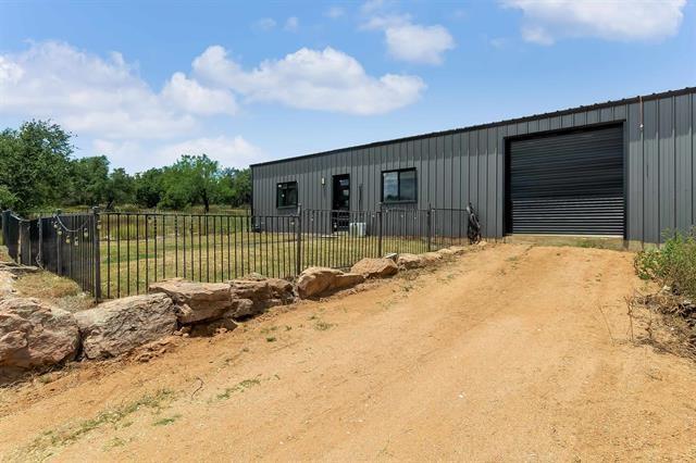 exterior space with a garage