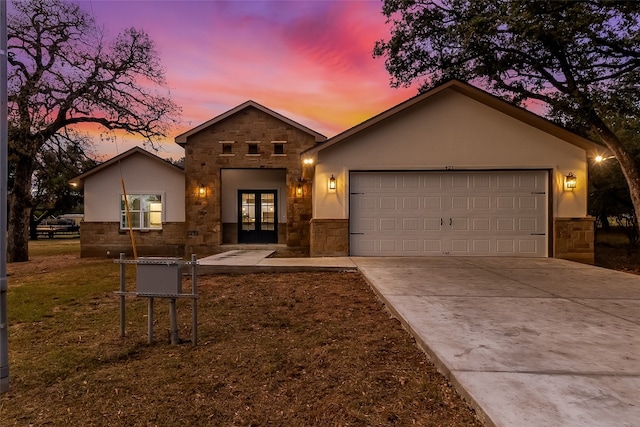 view of front of property with a garage