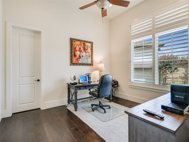 office with ceiling fan and dark hardwood / wood-style flooring