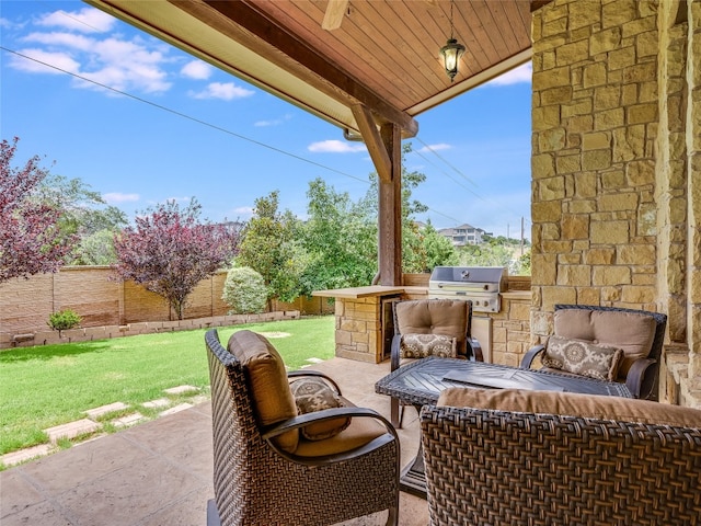 view of patio / terrace with area for grilling and exterior kitchen