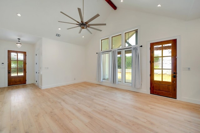 unfurnished living room with light hardwood / wood-style floors, beam ceiling, high vaulted ceiling, and ceiling fan with notable chandelier