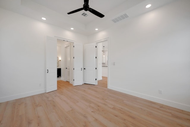 unfurnished bedroom featuring light hardwood / wood-style flooring and ceiling fan