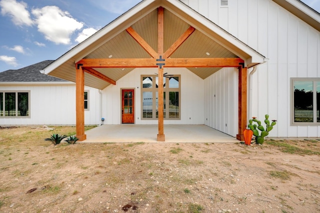 rear view of house with a patio area and french doors