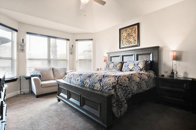 bedroom featuring carpet floors, multiple windows, baseboards, and a ceiling fan