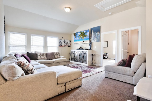 living room with vaulted ceiling and carpet floors