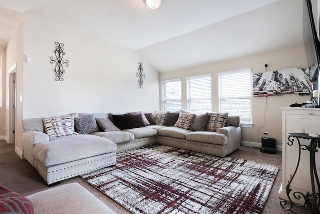 living room with lofted ceiling and carpet