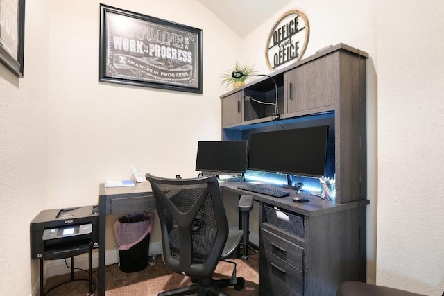 office with carpet and vaulted ceiling