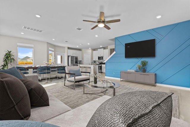 living room with ceiling fan