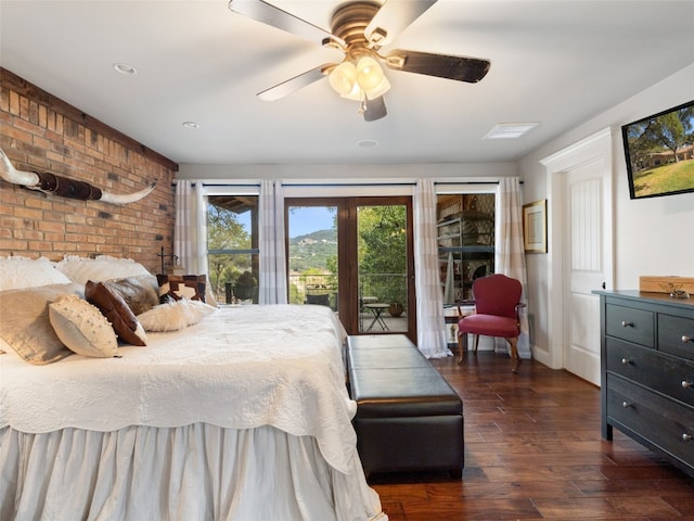 bedroom with dark hardwood / wood-style flooring, access to exterior, and ceiling fan