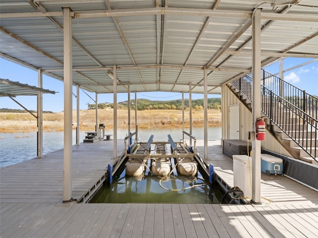 dock area featuring a water view