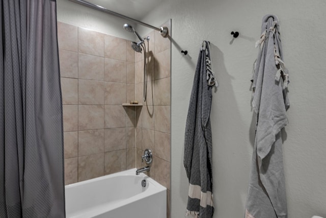 bathroom with shower / tub combo