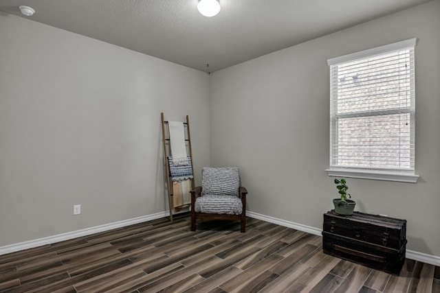 living area featuring dark hardwood / wood-style floors