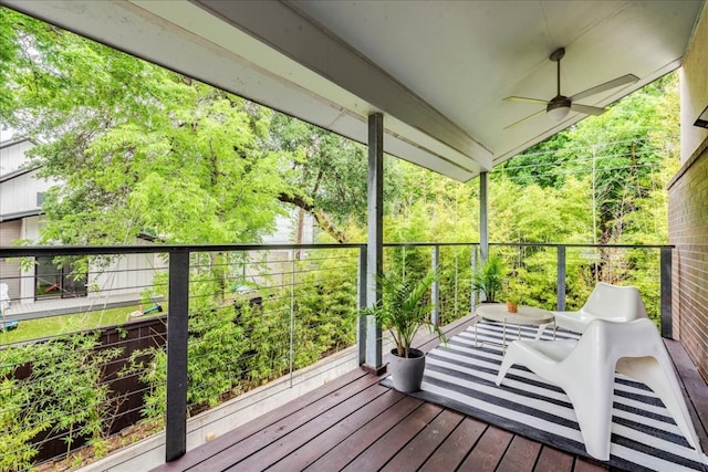 balcony featuring ceiling fan