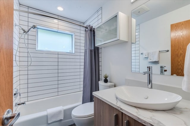 full bathroom featuring vanity, toilet, and shower / bathtub combination with curtain