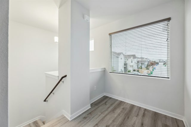 spare room featuring light wood-type flooring