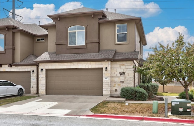 view of front of property with a garage