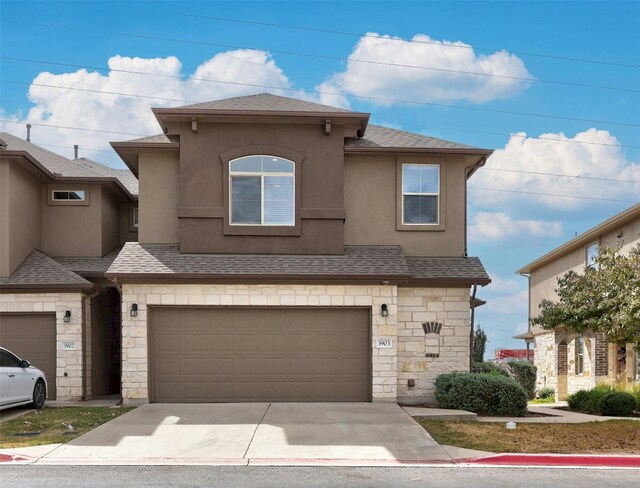 view of front of property featuring a garage