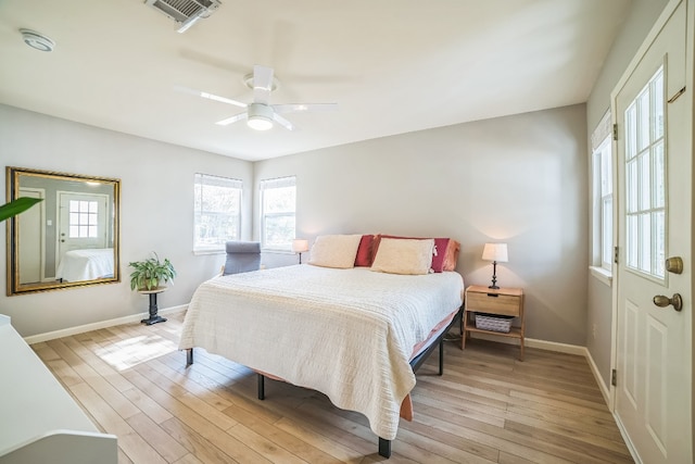 bedroom featuring ceiling fan and light hardwood / wood-style flooring