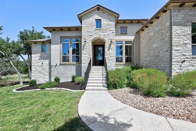 view of front facade with a front lawn