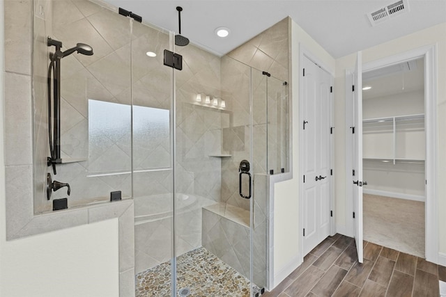 bathroom featuring walk in shower