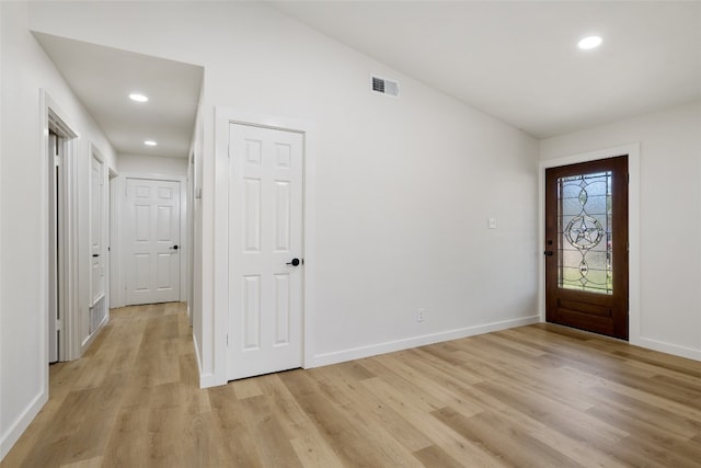 entryway with light hardwood / wood-style flooring