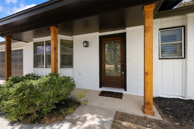 property entrance with covered porch