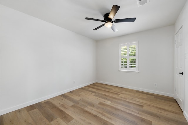 empty room with light hardwood / wood-style floors and ceiling fan