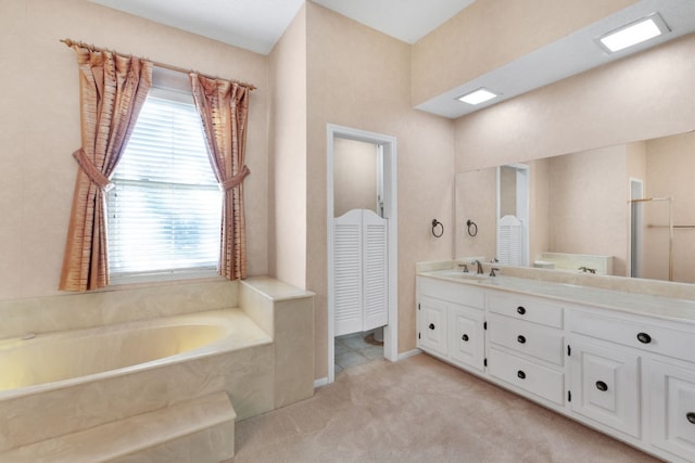 bathroom featuring vanity and plus walk in shower