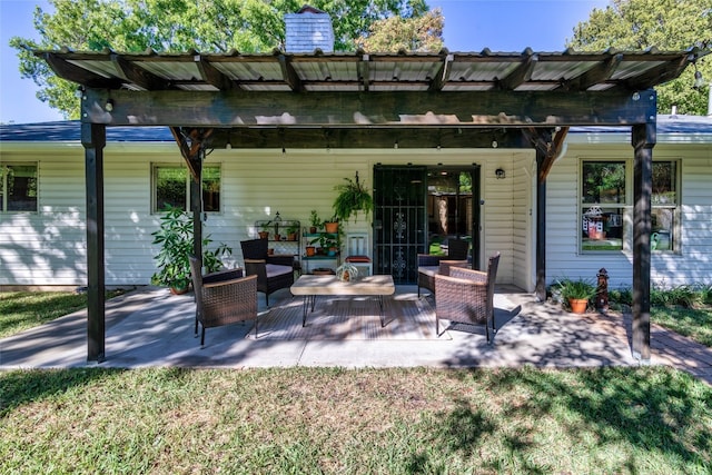 view of patio / terrace with outdoor lounge area and a pergola