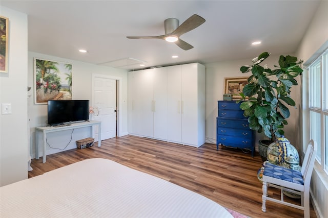 unfurnished bedroom featuring hardwood / wood-style flooring and ceiling fan