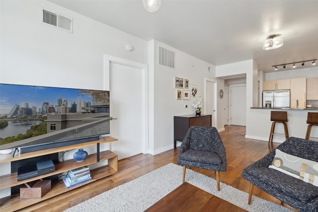 living room with hardwood / wood-style floors