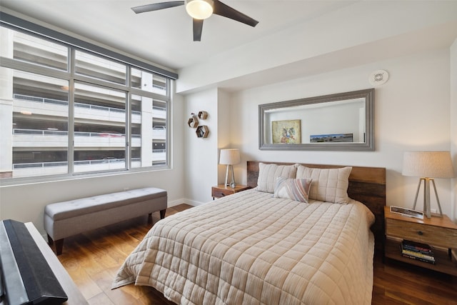 bedroom with hardwood / wood-style flooring and ceiling fan