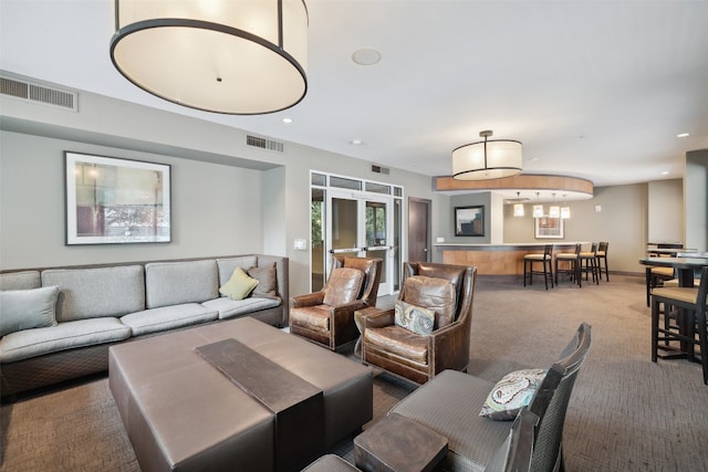 living room featuring carpet floors