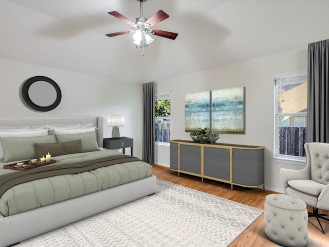 bedroom with hardwood / wood-style floors and ceiling fan