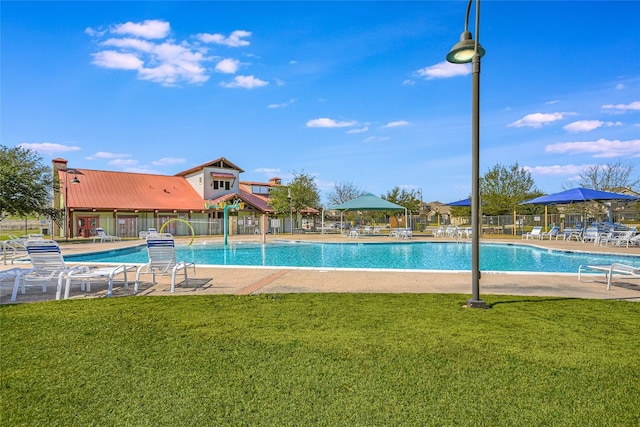 view of swimming pool featuring a gazebo, a lawn, and a patio area