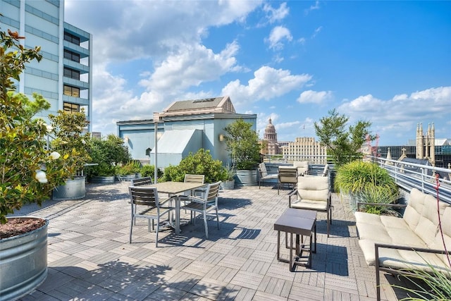 800 Brazos St Unit 702, Austin, TX 78701 - view of patio with outdoor dining space, a view of city, and outdoor lounge area