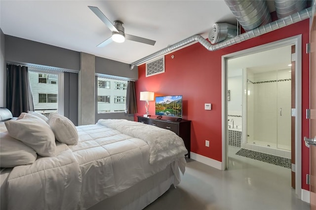 800 Brazos St Unit 702, Austin, TX 78701 - bedroom featuring baseboards, finished concrete flooring, ceiling fan, and ensuite bathroom