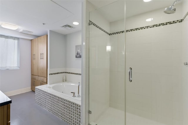 800 Brazos St Unit 702, Austin, TX 78701 - bathroom with a stall shower, a bath, vanity, and baseboards