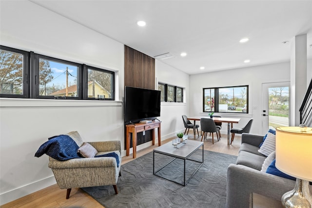 living room with light hardwood / wood-style floors